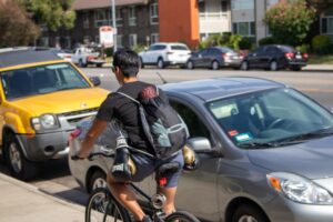 Riverside, CA – Bicyclist Hurt in Car Crash on Cajalco Rd at Wood Rd
